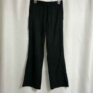 Women’s Purple Label black scrub pants.  Size S